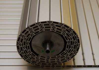 Armoured blind on open roller