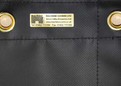 Close-up of a fabric machine dust cover