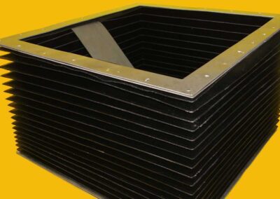 Square welded construction bellows with a steel end frame
