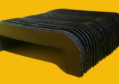 Welded concertina cover with heat-sealed folds