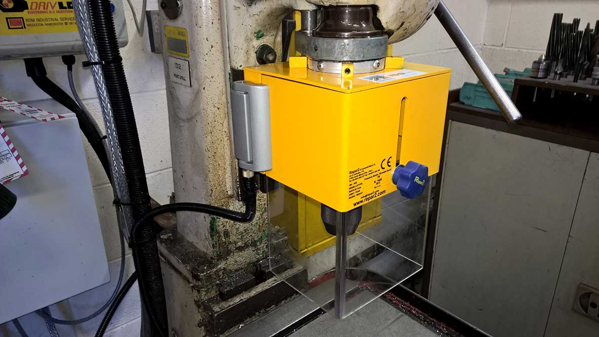 TRTCM guard fitted to a drilling machine